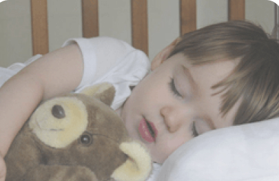 Kind in bed